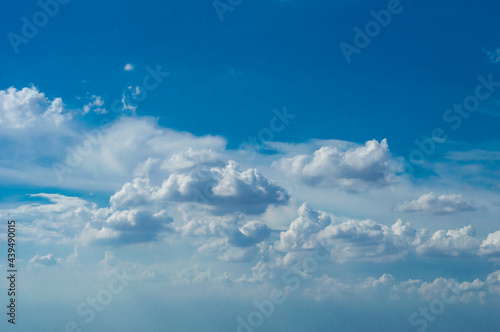 blue sky background with tiny clouds. panorama white fluffy clouds in the blue sky.Beautiful vast blue sky with amazing cloud background.Wide sky panorama with scattered cumulus clouds.