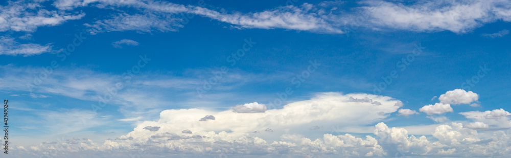 blue sky background with tiny clouds. panorama white fluffy clouds in the blue sky.Beautiful vast blue sky with amazing cloud background.Wide sky panorama with scattered cumulus clouds. blue sky background with tiny clouds. panorama white fluffy clouds in the blue sky.Beautiful vast blue sky with amazing cloud background.Wide sky panorama with scattered cumulus clouds.