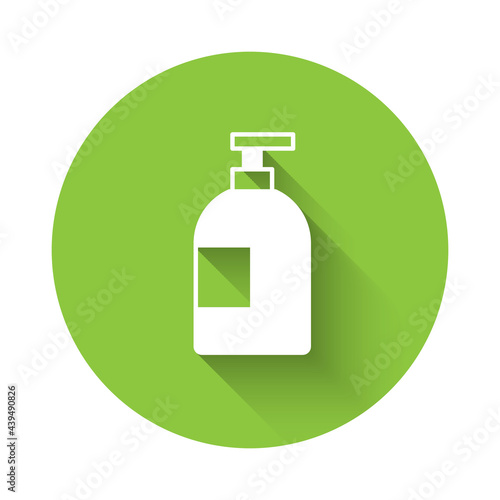 White Dishwashing liquid bottle icon isolated with long shadow background. Liquid detergent for washing dishes. Green circle button. Vector