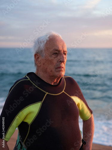 Aged man in the beach photo
