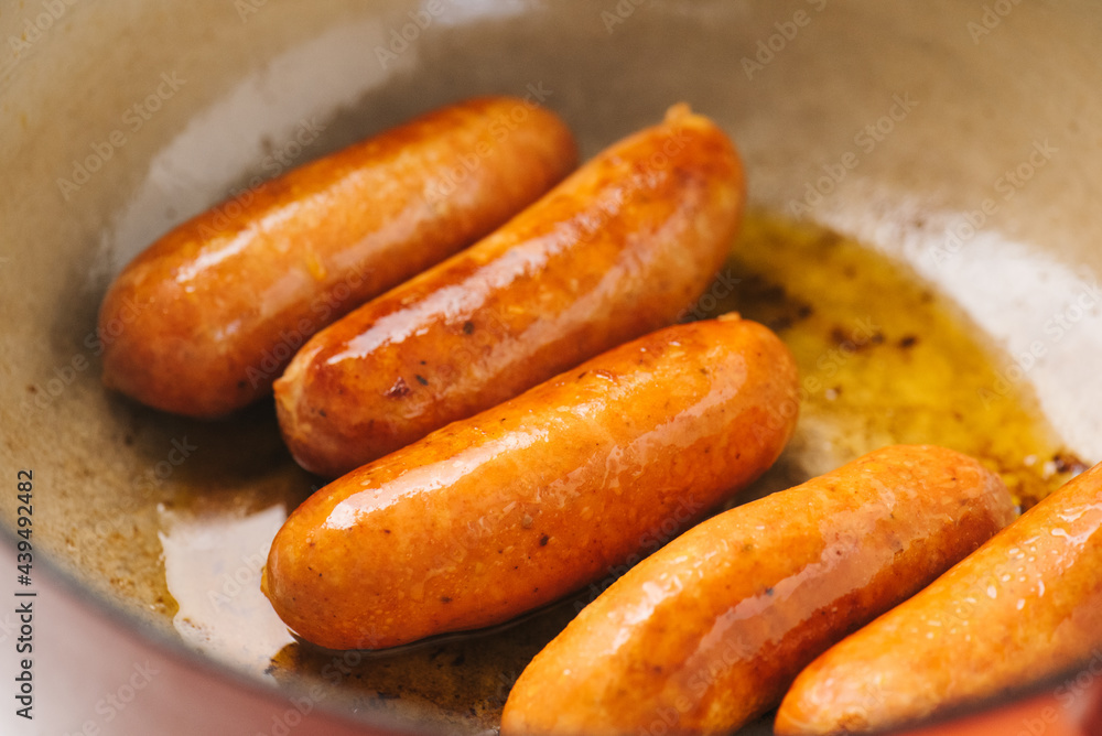 Chorizo sausage links cooking in a large pot Chorizo sausage links cooking in a large pot