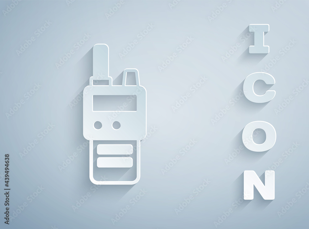 Paper cut Walkie talkie icon isolated on grey background. Portable radio transmitter icon. Radio transceiver sign. Paper art style. Vector Paper cut Walkie talkie icon isolated on grey background. Portable radio transmitter icon. Radio transceiver sign. Paper art style. Vector