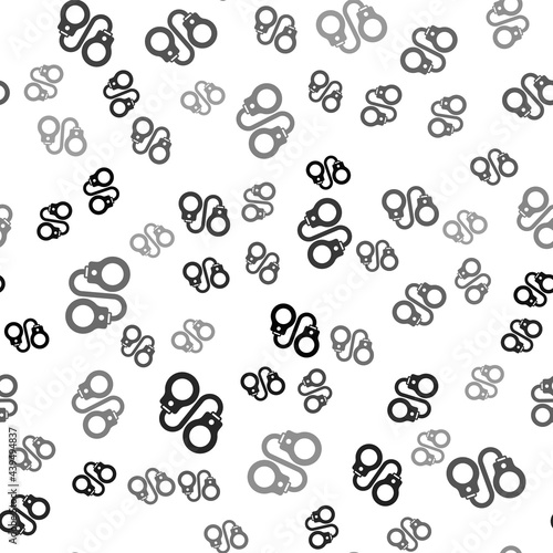 Black Handcuffs icon isolated seamless pattern on white background. Vector
