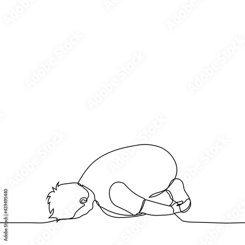 man lies on the floor in a face-down fetal position - one line drawing. the concept of frustration, finding comfort, self-practice yoga photo
