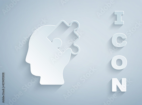 Paper cut Solution to the problem in psychology icon isolated on grey background. Puzzle. Therapy for mental health. Paper art style. Vector