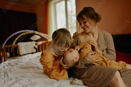 
Young woman with two children