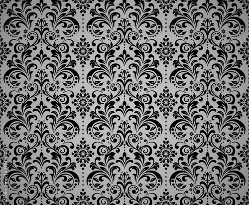 Wallpaper in the style of Baroque. Seamless vector background. Black and gray floral ornament. Graphic pattern for fabric, wallpaper, packaging. Ornate Damask flower ornament