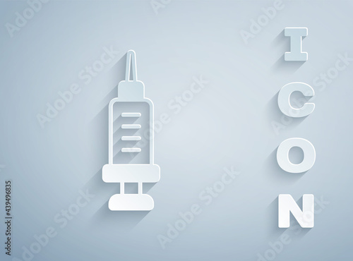 Paper cut Addiction to the drug icon isolated on grey background. Heroin, narcotic, addiction, illegal. Sick junkie with a syringe and medical pills. Paper art style. Vector