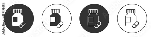 Black Sedative pills icon isolated on white background. Circle button. Vector