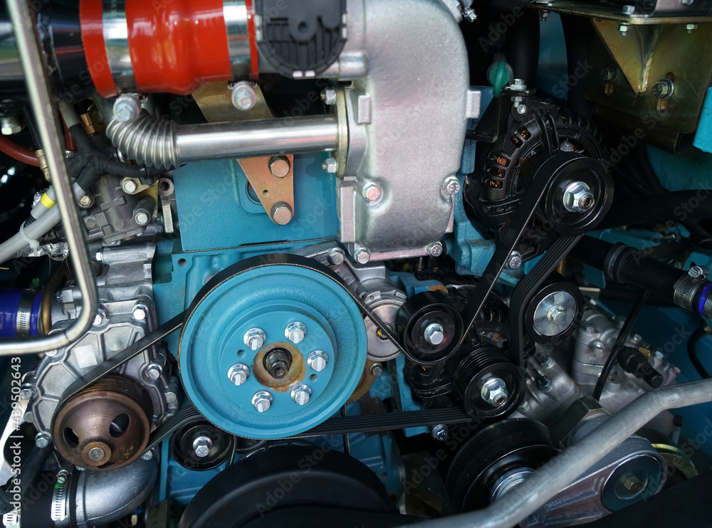 Close up view on new bus electric engine compartment motor belts