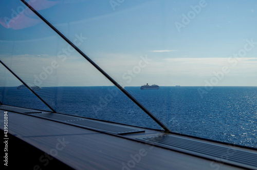 Costa cruiseships or cruise ship liners Pacifica, Fortuna and Favolosa anchored at sea offshore of Civitavecchia, Rome in Italy on sunny summer day with blue sky due to Corona Pandemic Pause photo