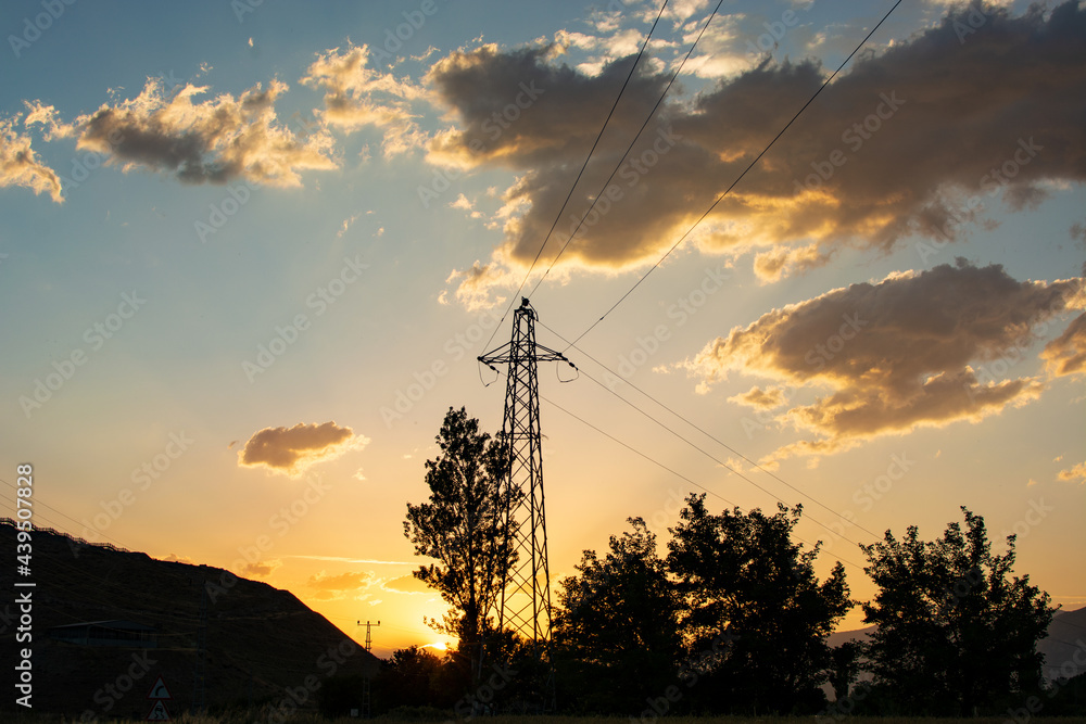 Electrical power lines and towers at sunset. Electrical power lines and towers at sunset.