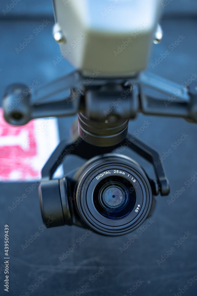Close Up of Camera Lens Attached to Gimbal Arm of UAV Drone