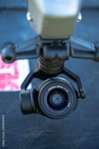 Close Up of Camera Lens Attached to Gimbal Arm of UAV Drone