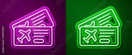 Glowing neon line Airline ticket icon isolated on purple and green background. Plane ticket. Vector