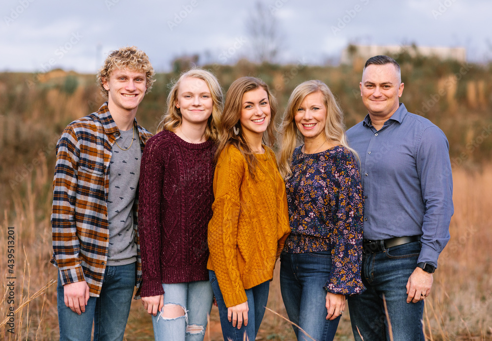 Happy Family with Teenagers Looking at Camera Happy Family with Teenagers Looking at Camera