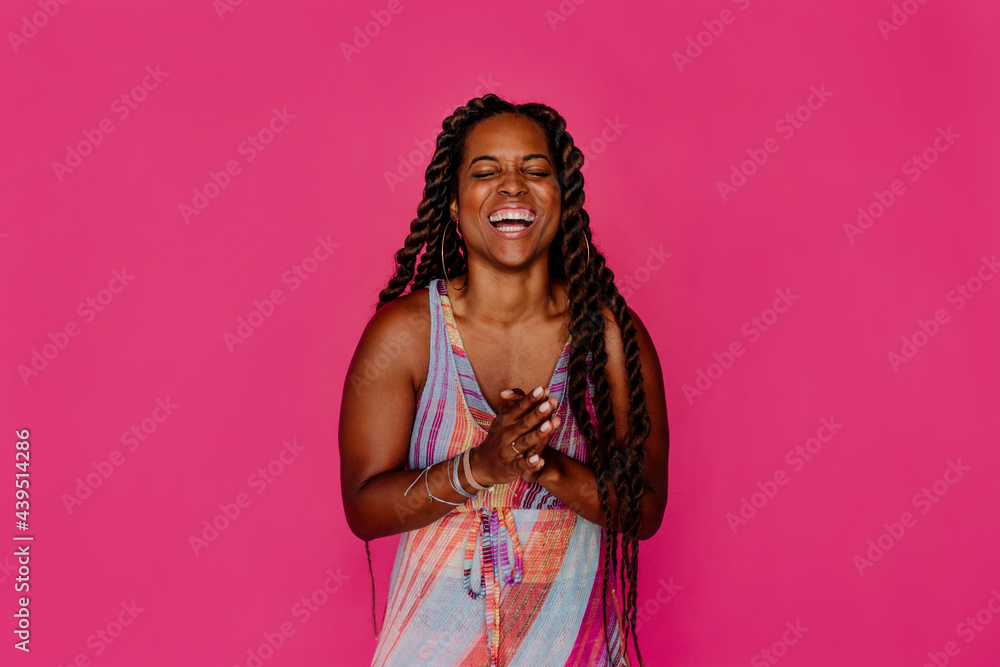 Beautiful laughing Black woman with long hair Beautiful laughing Black woman with long hair