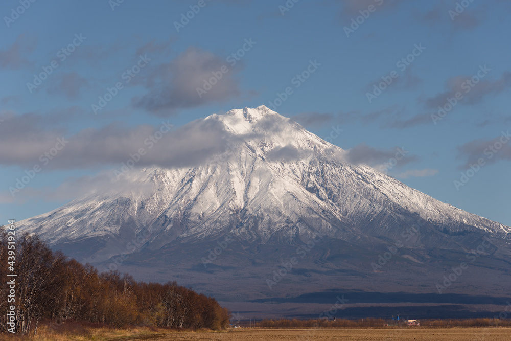 Popular tourist destination in Russia: Kamchatka Peninsula. The spectacular Koryaksky Volcano.