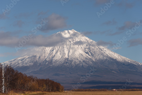 Popular tourist destination in Russia  Kamchatka Peninsula. The spectacular Koryaksky Volcano.