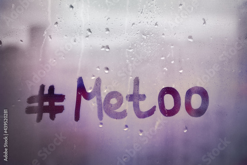 words with hashtag Metoo on window by written finger concept photo on purple rainy background photo