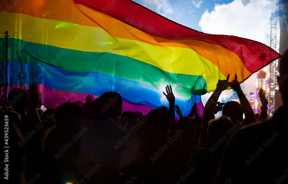 © erika8213 - Gay parade with LGBT flag. © erika8213 - Gay parade with LGBT flag.
