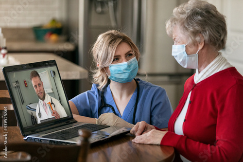 Health: Nurse Instructs Senior On Virtual Health Visit photo