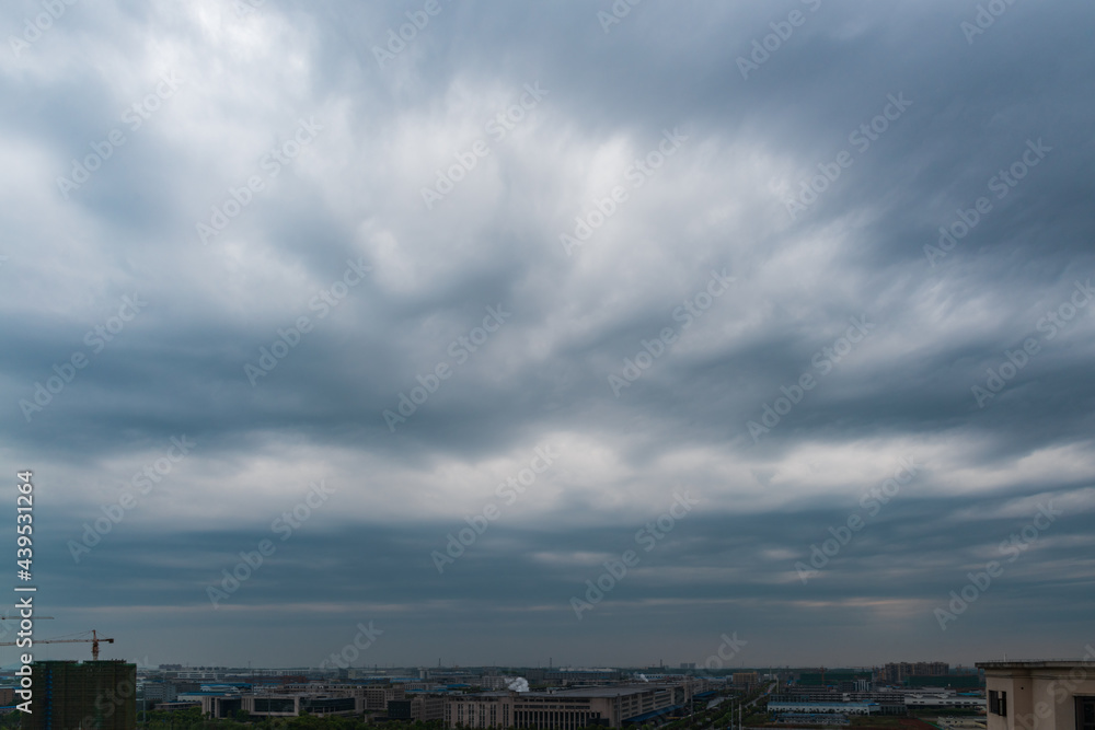 China's high-rise buildings under the dark clouds, the decline of China's real estate industry. China's high-rise buildings under the dark clouds, the decline of China's real estate industry.