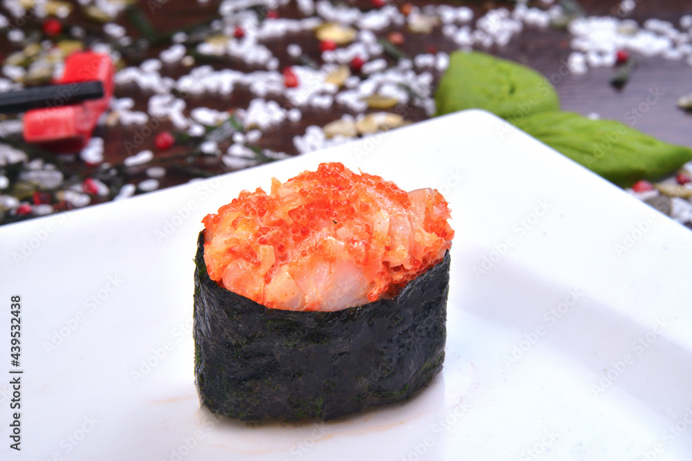 Spicy gunkan maki sushi with isolated on white background side view Spicy gunkan maki sushi with isolated on white background side view