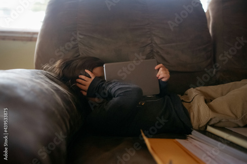 A sassy girl hiding her face. 