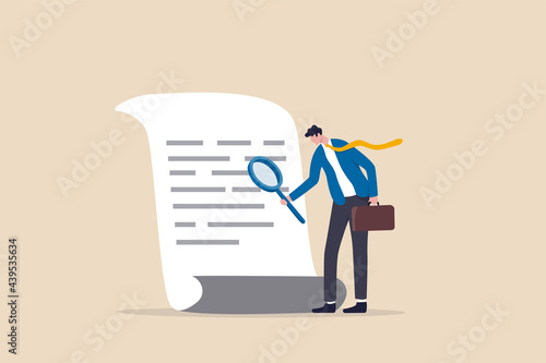 Document checking, agreement or contract validation, financial or budget analysis, search for document files concept, businessman manager holding big magnifying glass checking document paper. photo