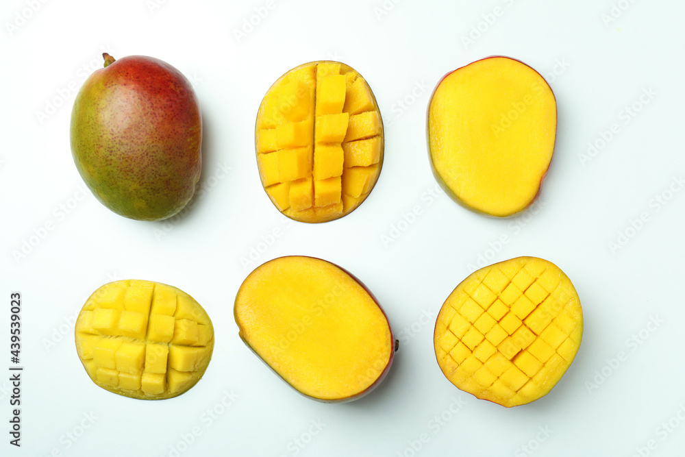 Ripe mango fruit on white background, top view Ripe mango fruit on white background, top view