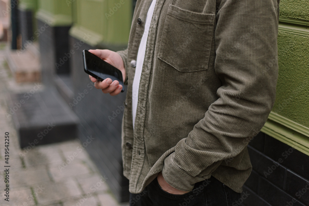 Young man using the phone Young man using the phone
