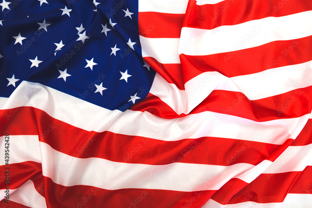The American Stars and Stripes flag waving. The American Stars and Stripes flag waving.