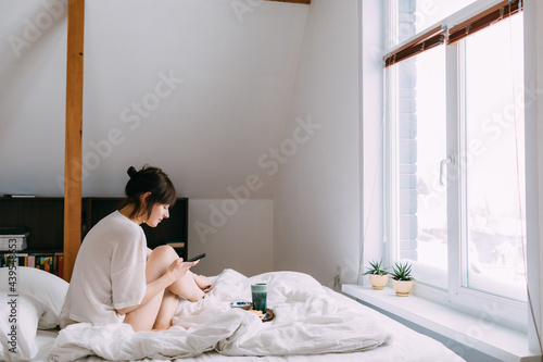 Woman Having Breakfast In Bed