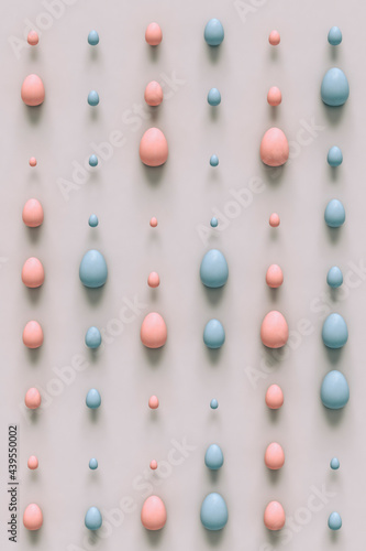 pattern of Pink and blue eggs in differet sizes photo