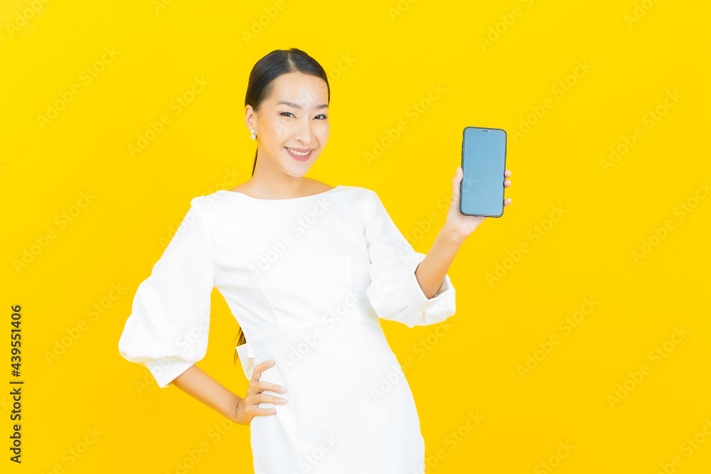 Portrait beautiful young asian woman smile with smart mobile phone Portrait beautiful young asian woman smile with smart mobile phone