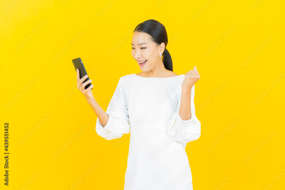 Portrait beautiful young asian woman smile with smart mobile phone Portrait beautiful young asian woman smile with smart mobile phone