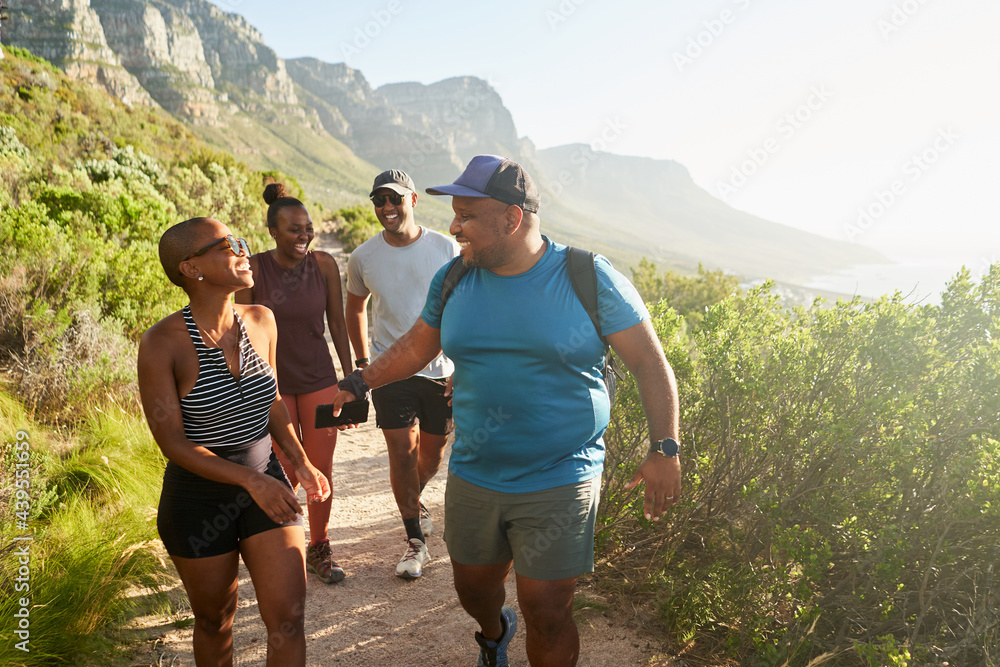 Friends hiking outdoors in nature Friends hiking outdoors in nature