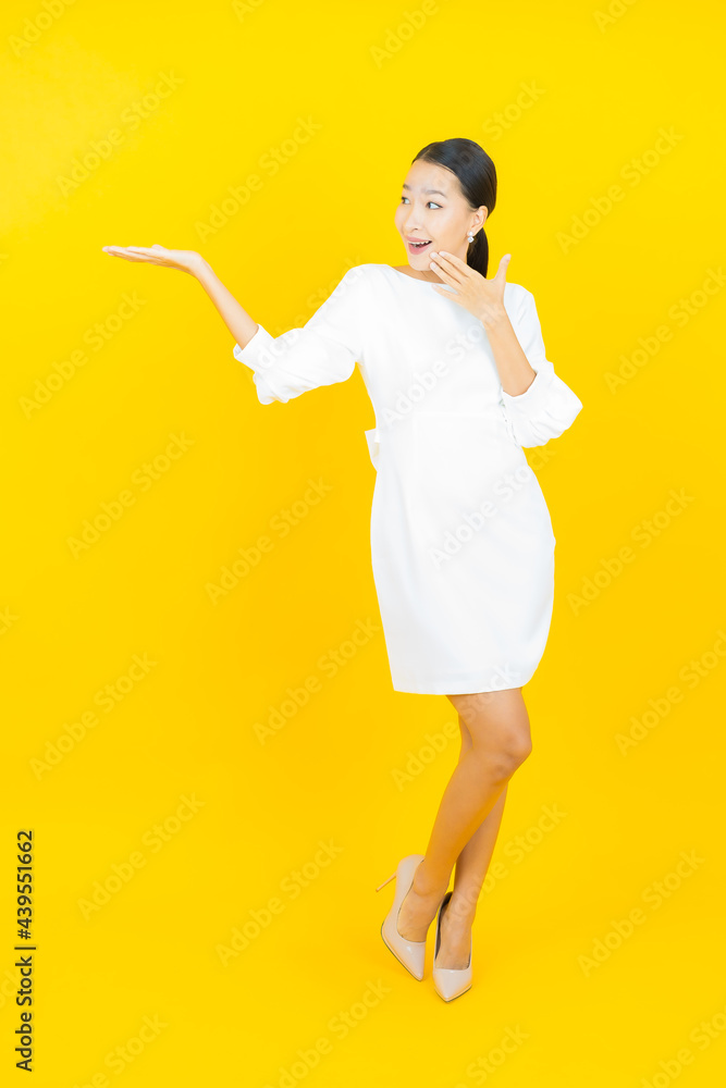 Portrait beautiful young asian woman smile with action Portrait beautiful young asian woman smile with action
