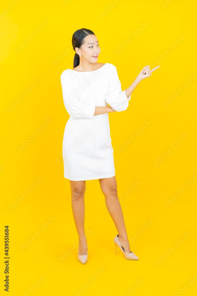 Portrait beautiful young asian woman smile with action Portrait beautiful young asian woman smile with action