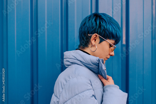 Stylish woman with blue hair photo