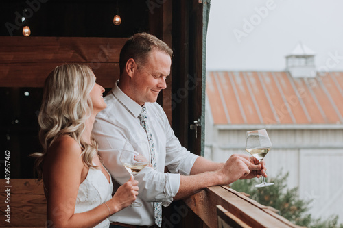 Wedding Couple Drinking Wine at Winery photo