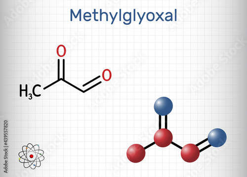 Methylglyoxal, MGO, pyruvaldehyde, pyruvic aldehyde molecule. It is used as flavoring agent, and in tanning. Structural chemical formula, molecule model. Sheet of paper in a cage photo