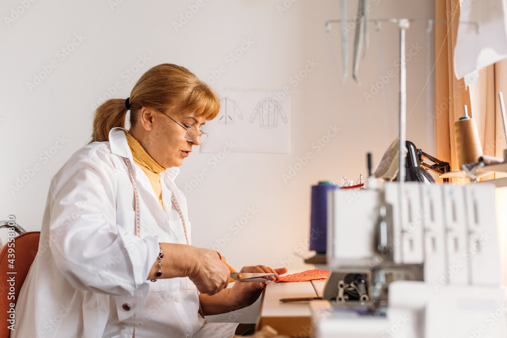 A Woman Sews A Woman Sews