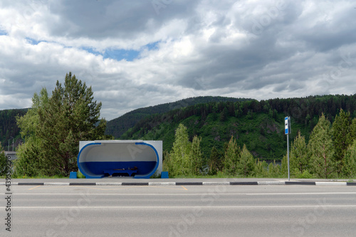 bus stop in nature in a beautiful location. tourism and travel, Siberian nature, sky and mountains