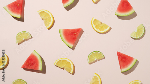 Playful composition of mixed fruit Lemon, Lime and Watermelon photo