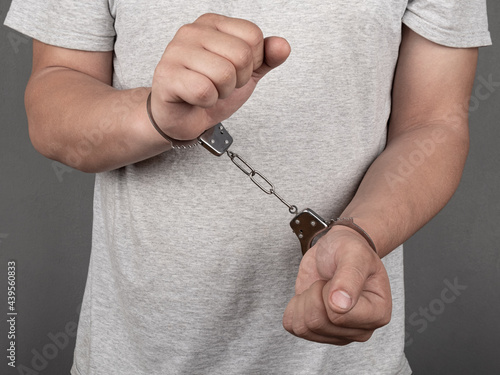 Canvas Print man trying to get out of handcuffs, arrested crime boss.