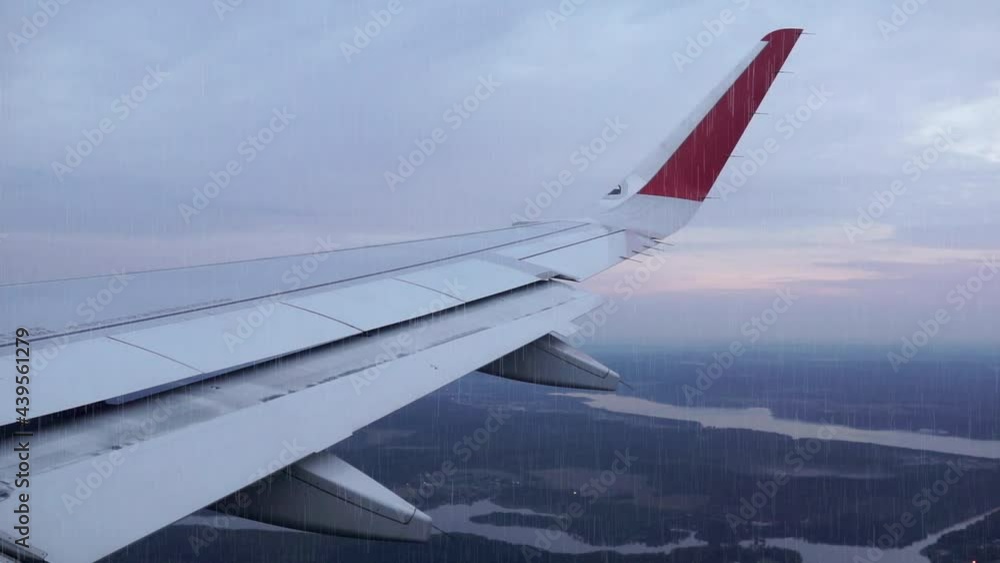 Raindrops fall from the sky. Airplane view, bad weather, concept of business travel. Raindrops fall from the sky. Airplane view, bad weather, concept of business travel.