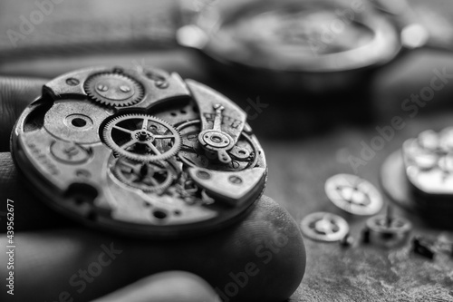 Mechanical watch repair. Watchmaker's workshop. Hihg accuracy level photo