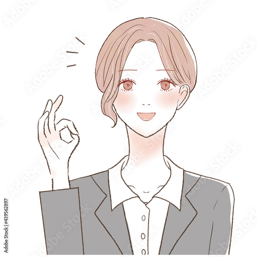 OKサインを出す女性社員